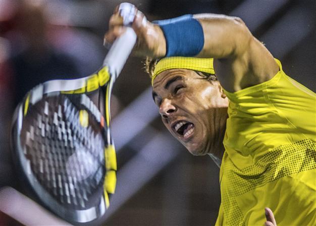 Nadal beats Djokovic to book Raonic title clash