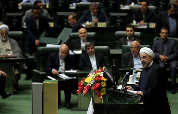 Rouhani defends cabinet choices as Iran parliament starts debate