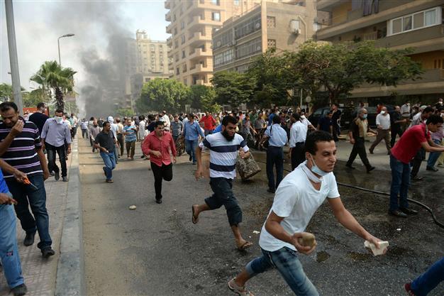 Egypt declares state of emergency after scores killed in Cairo crackdown