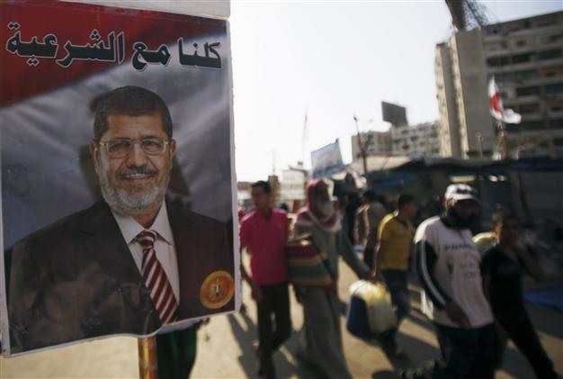 Egypts interim PM defends crackdown on Morsi supporters, slams anarchy