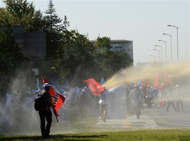 Police intervene with water cannons and tear gas in union march in Ankara