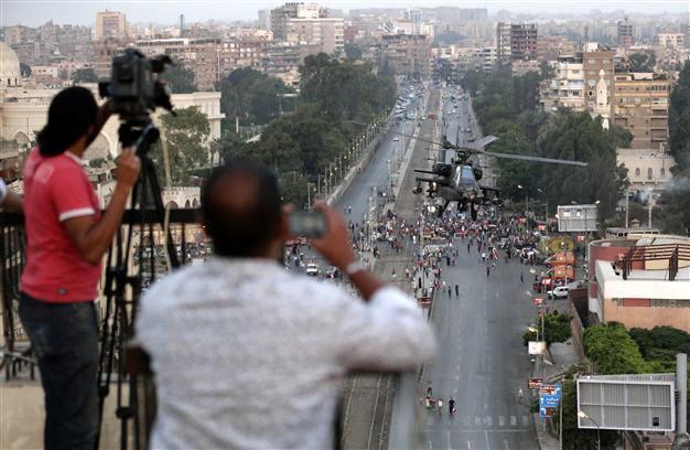 Egypt detains four Al-Jazeera journalists in Cairo