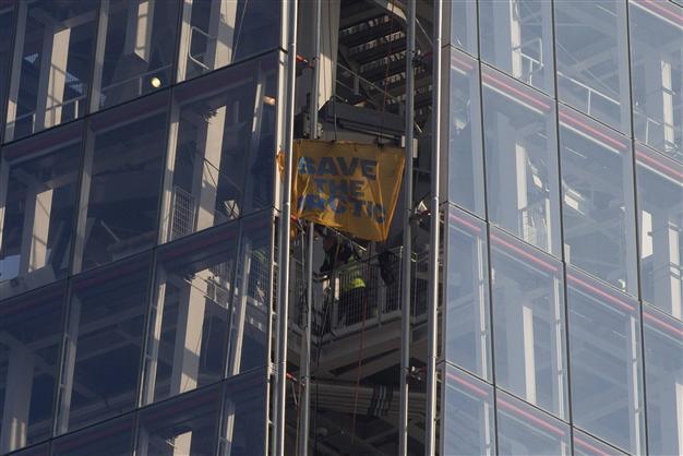Greenpeace women arrested after scaling Londons Shard
