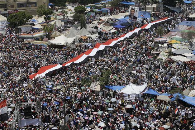 Morsi supporters mass in Cairo vowing to defy coup