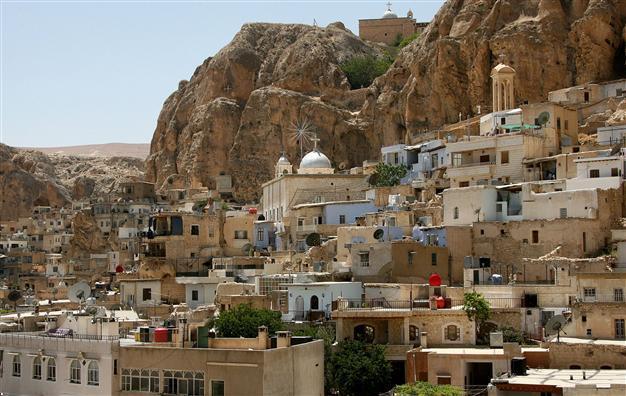 Syria rebels withdraw from Christian town: Coalition