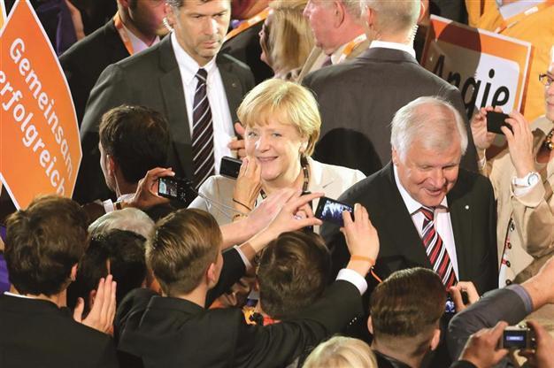 Merkel keeps strong lead despite opposition boost