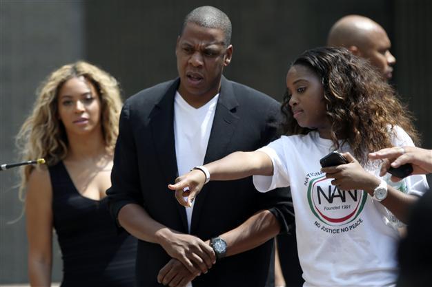 Jay Z and Beyonce join US protests over slain teen