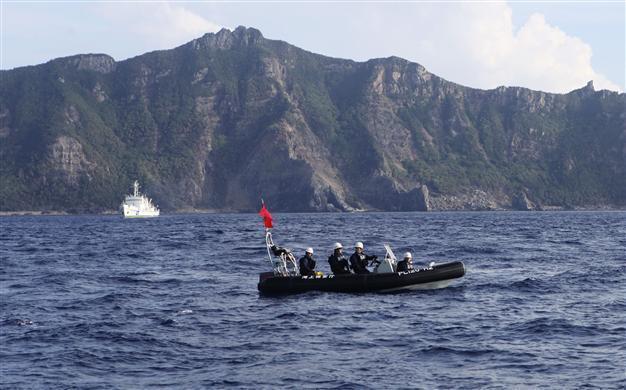 Japan scrambles jets for drone near disputed islands
