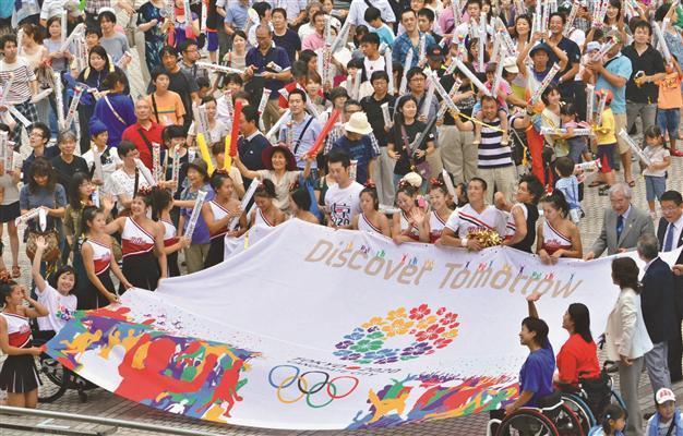 Japan Olympic win boosts Abe, but Fukushima shadows linger