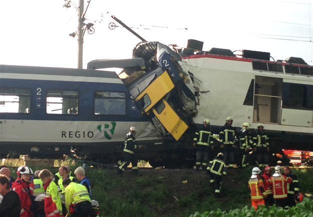 Swiss train crash kills driver, injures 35: police