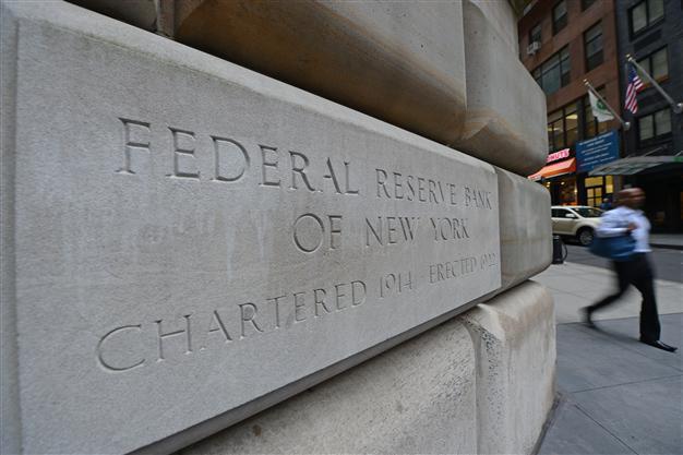 Fed keeps stimulus in place, worried about rise in borrowing costs