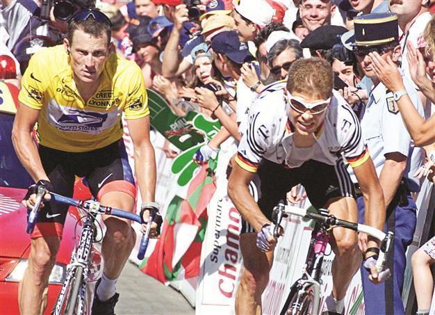 Armstrong says Olympic medal headed back to IOC