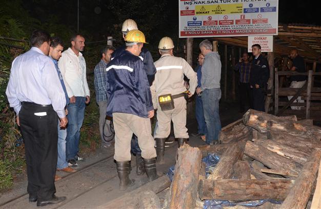 Miners walk out from coal mine wreckage in northern Turkish province