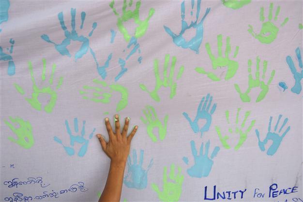 Hundreds join Myanmar march to end ethnic conflicts