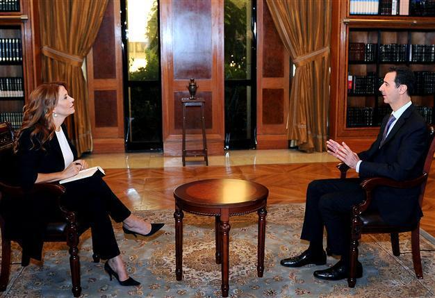 Al-Assad says Syria will comply with UN arms resolution
