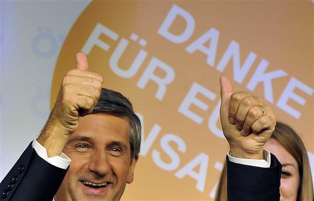 Austrian centrist coalition survives far-right gains