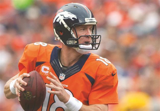 Manning’s Broncos roll over Eagles
