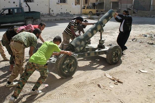 Syria rebels try to end infighting near Turkish border