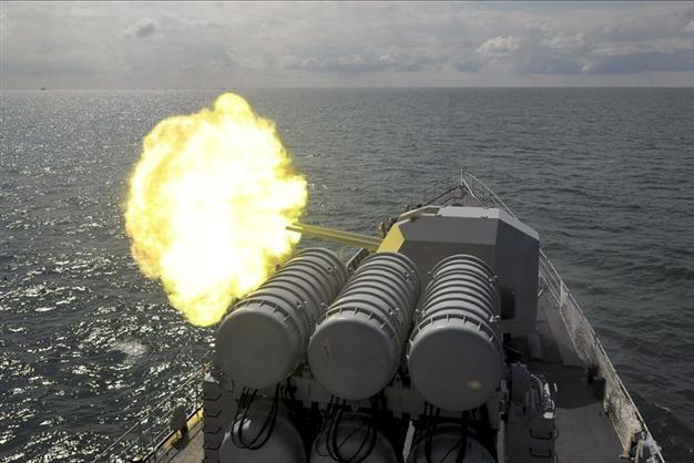 China warns US, Japan, Australia not to gang up in sea disputes