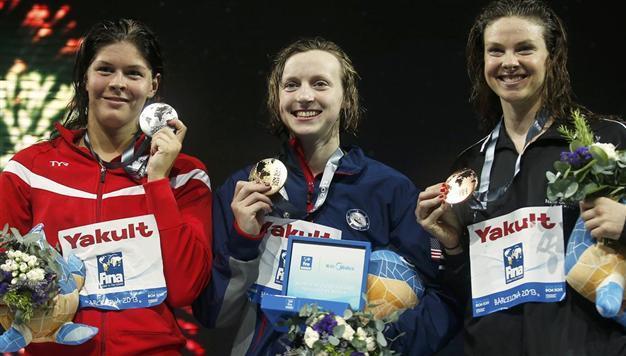 Ledecky claims second world record, fourth gold