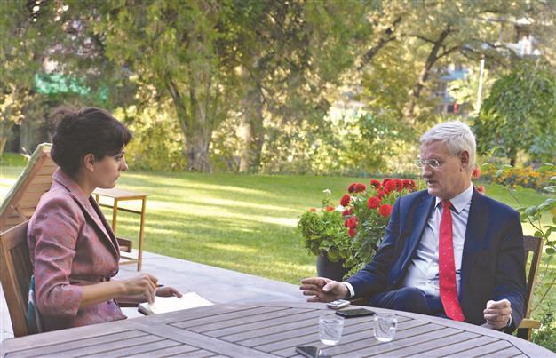 Syria’s al-Assad playing for time, will eventually go: Swedish FM Carl Bildt