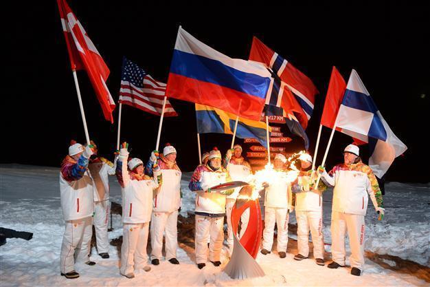 Russia takes Olympic torch to North Pole