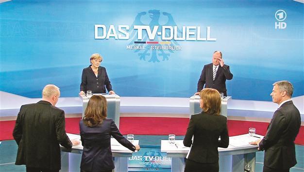 Merkel and challenger clash on European austerity on TV