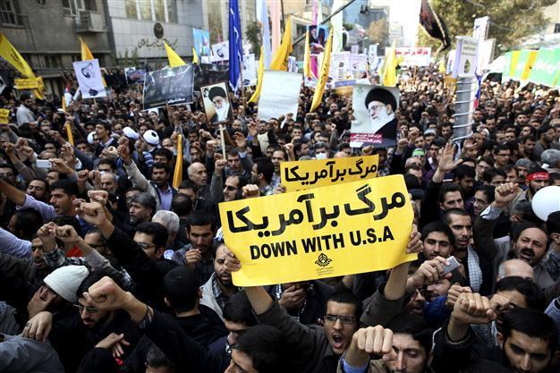 Iran hardliners jab at Rouhani on embassy siege anniversary