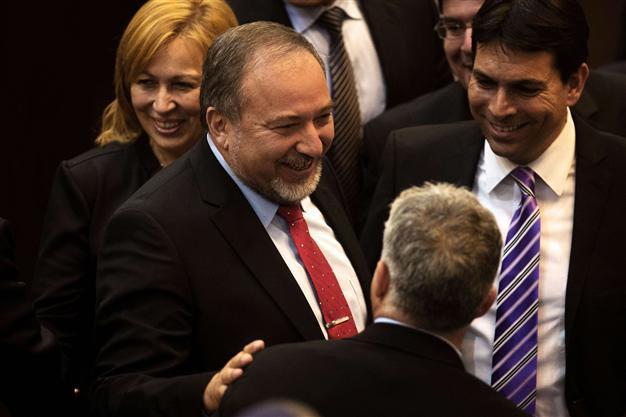 Israeli rightist Lieberman sworn back in as foreign minister