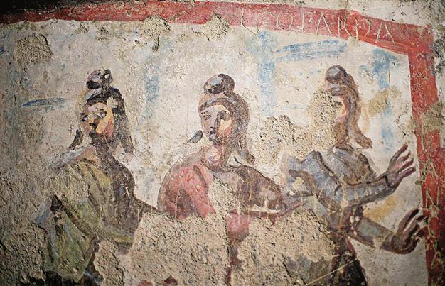Rome catacomb frescoes add to debate on women priests