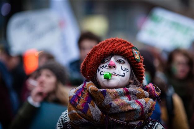 Activists march in Warsaw against climate change ahead of UN conference