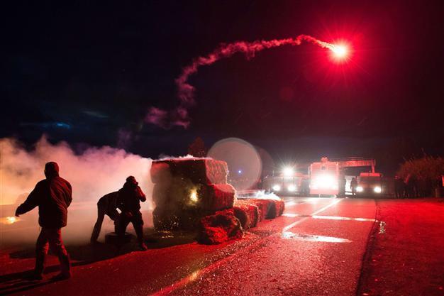 France asks farmers to end Paris blockade after drivers death