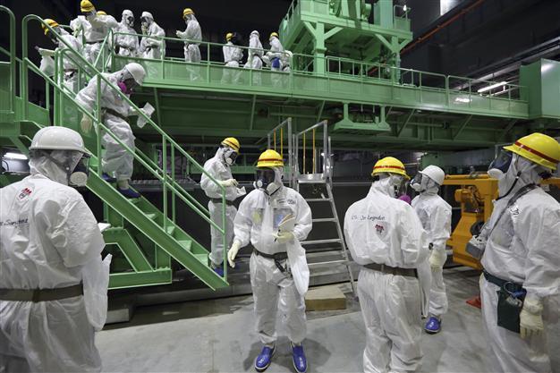 Fukushima operator starts dangerous fuel-rod removal