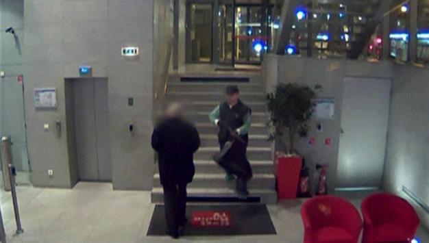 Huge hunt for Paris gunman, victim critical but better
