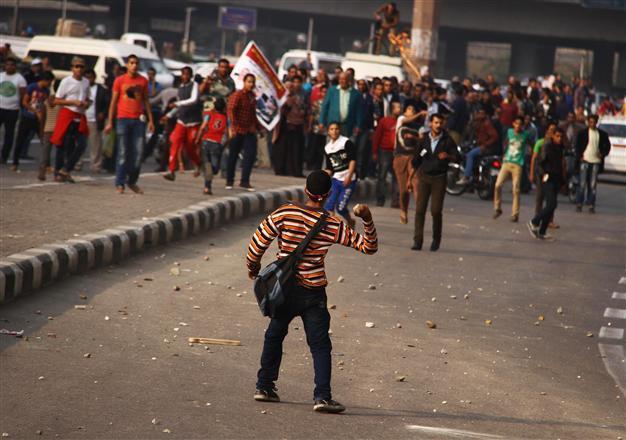 Egypt army backers, opponents scuffle on anniversary