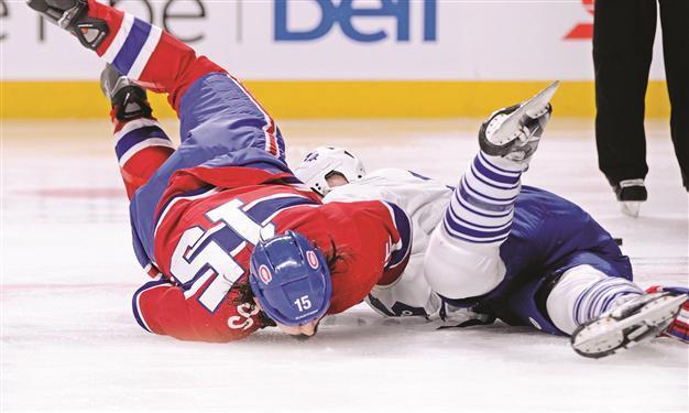 Former hockey stars sue league over concussions
