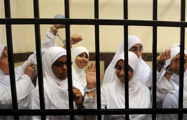 Egypt jails Brotherhood women, orders activist arrests