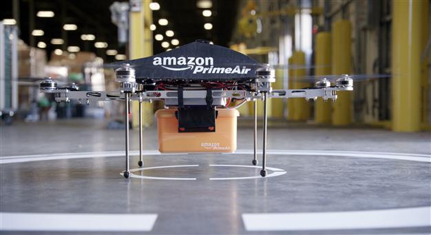 Amazon testing delivery with drones, CEO Bezos says