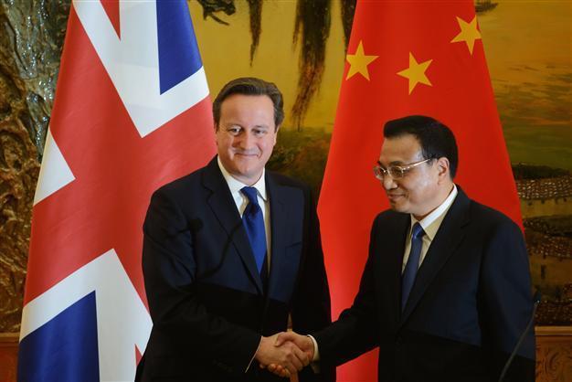 Britains Cameron pushes EU-China trade deal in Beijing