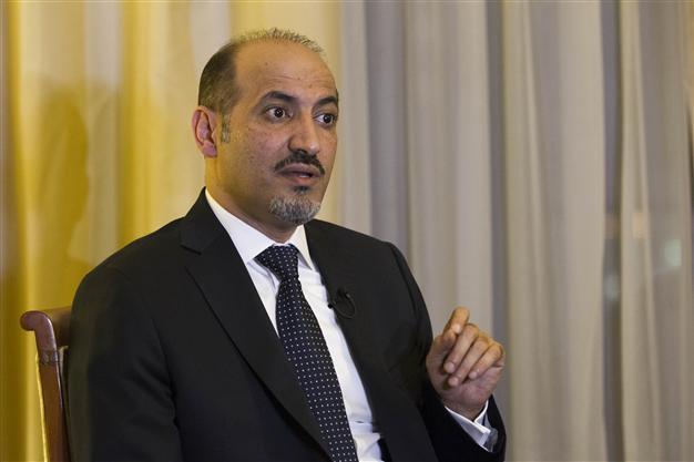 Syria opposition leader says to visit Russia