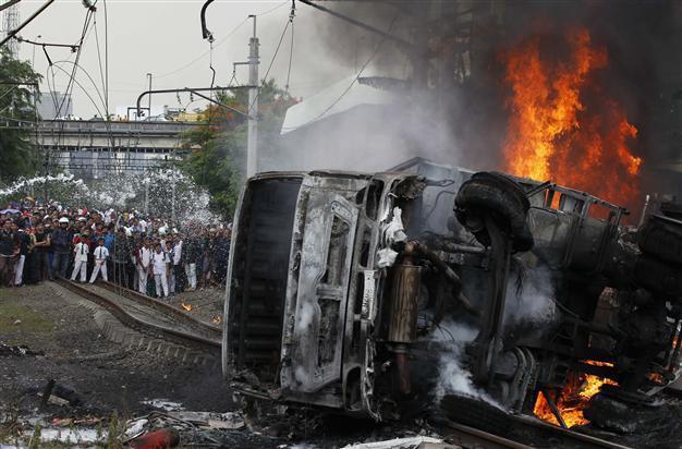 Five dead as Indonesia train collides with fuel tanker