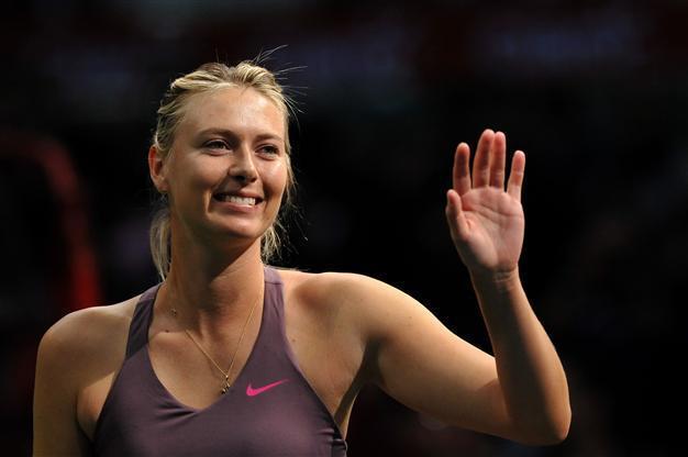 Sharapova happy with baby step return