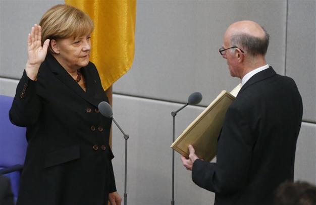 Merkel elected to third term in parliament vote