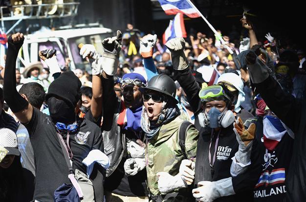 Thai anti-govt protesters rally at police HQ; navy chief rules out coup