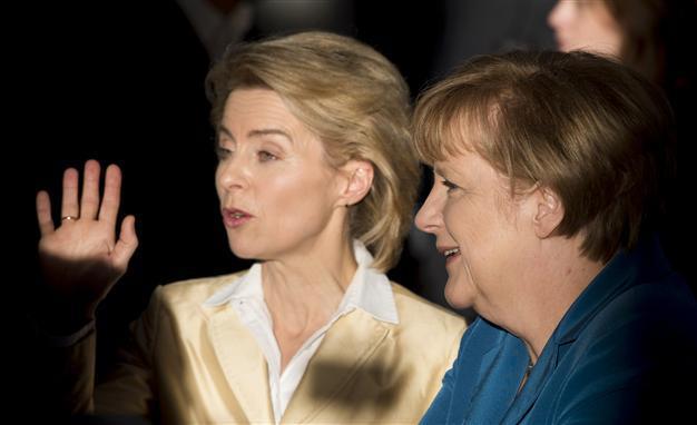 Merkel to launch government with centre-left rivals