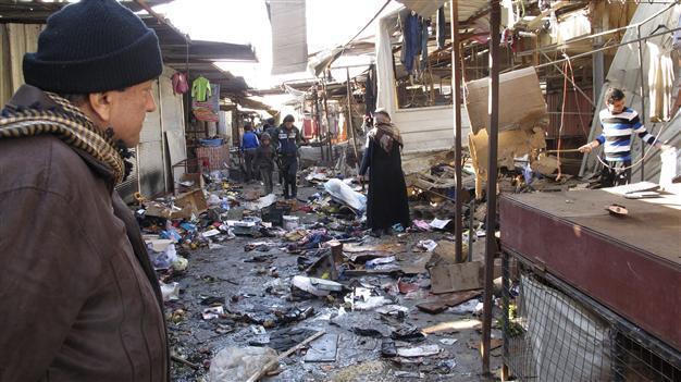 Market bombing, spate of attacks kill 40 in Iraq