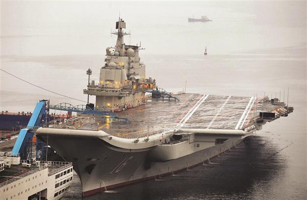 Aircraft carrier tests going well: Beijing