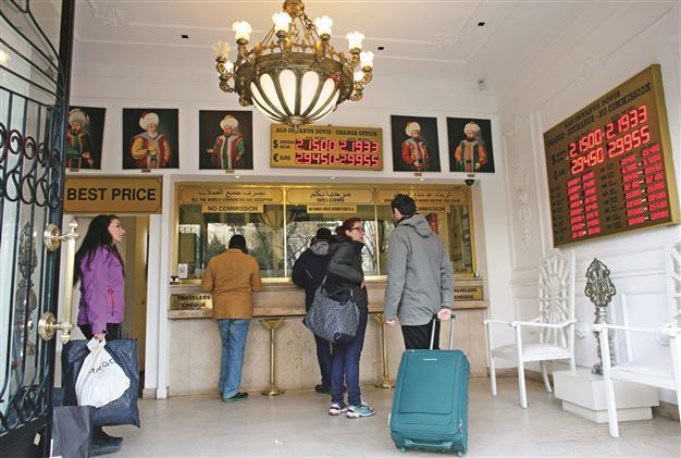 Turkish lira slips against US dollar but bond curve returns to positive