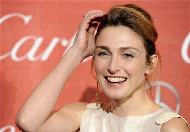 Actress linked to Hollande sues magazine over affair report