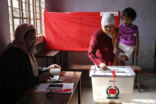 18 dead, polling booths firebombed as Bangladesh votes